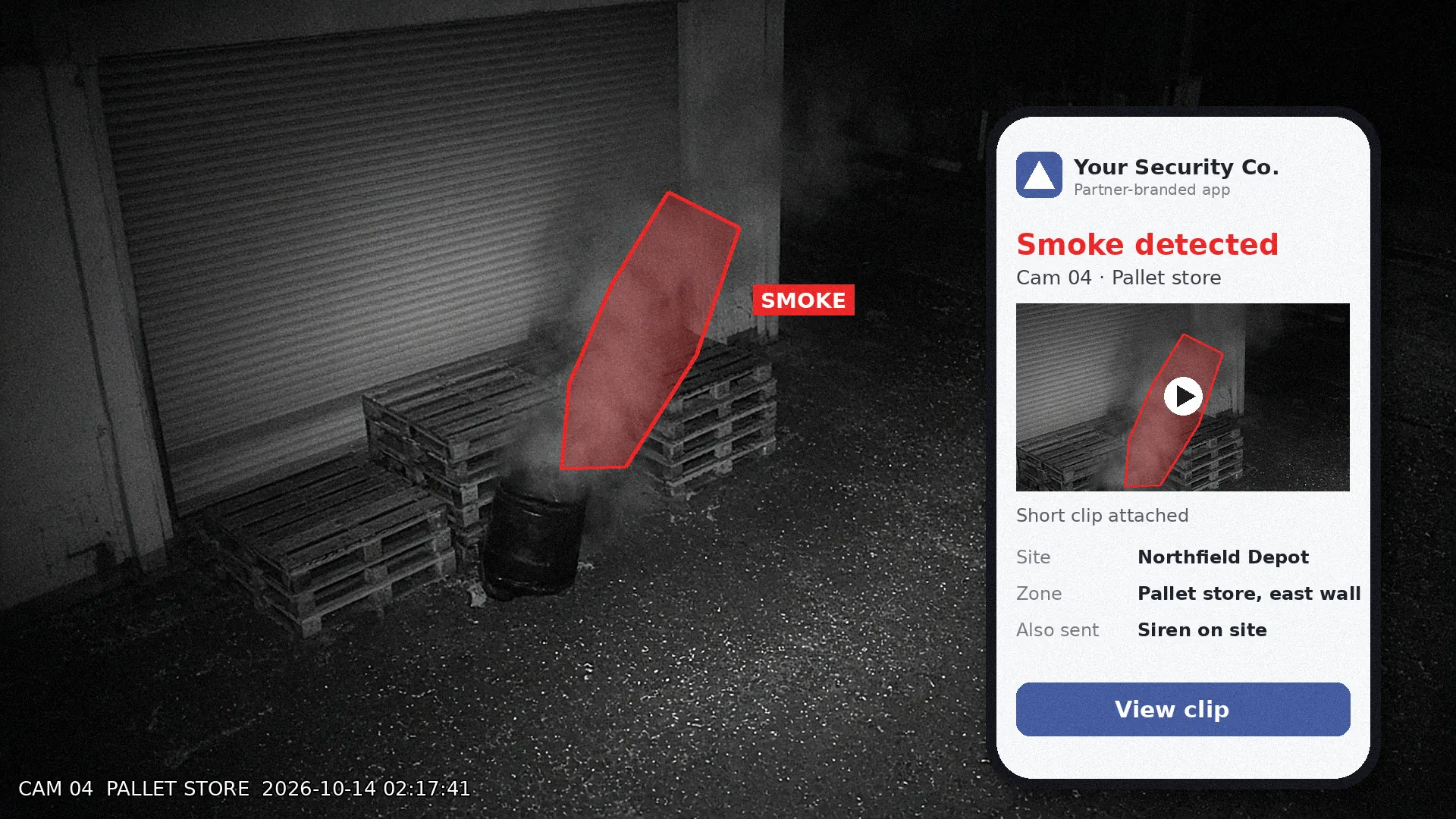 Night CCTV of smoke rising from a bin by stacked pallets, with the alert and clip in a partner-branded app