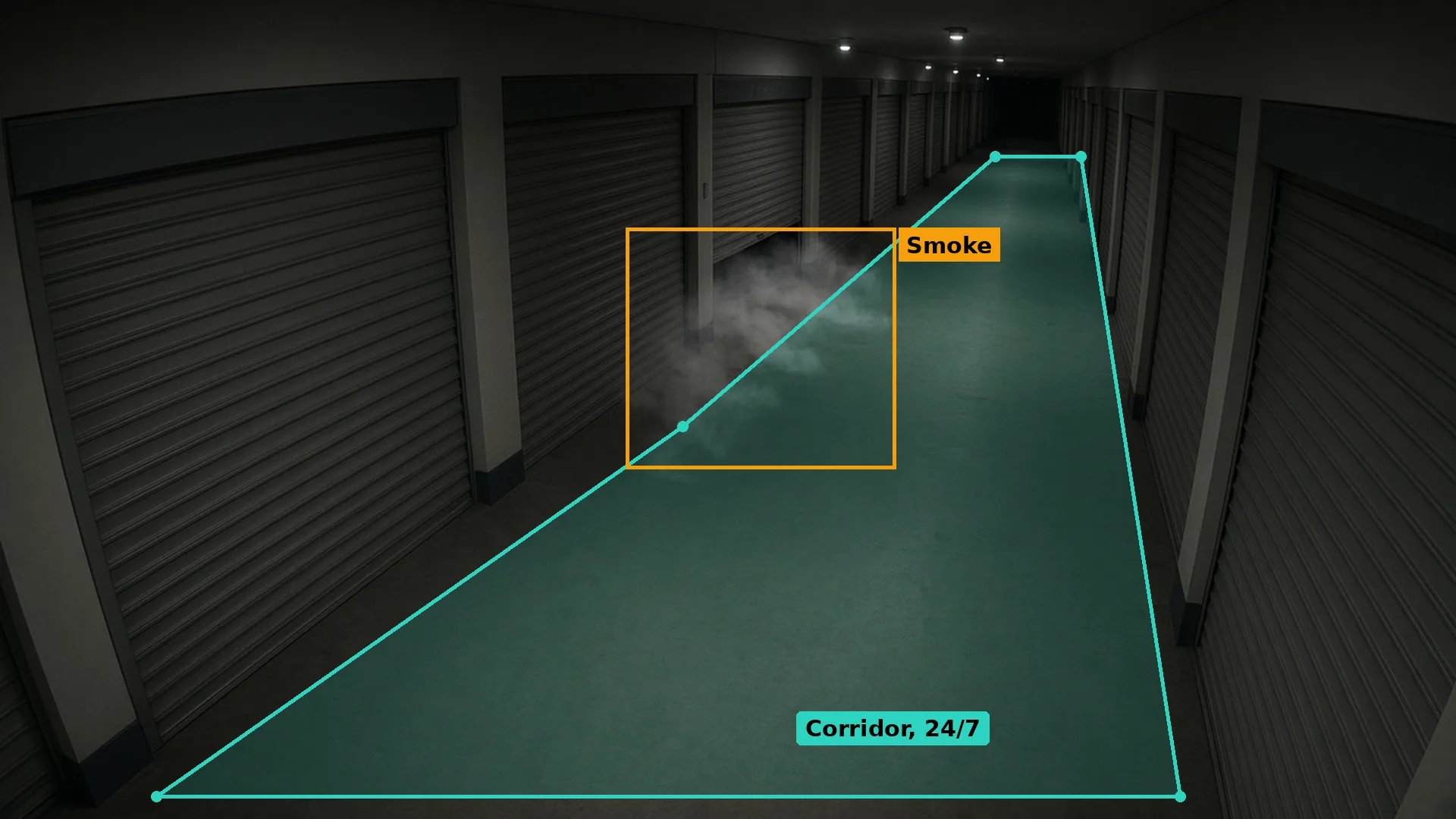 Night CCTV of smoke drifting from under a roller shutter in an empty self-storage corridor, boxed in amber